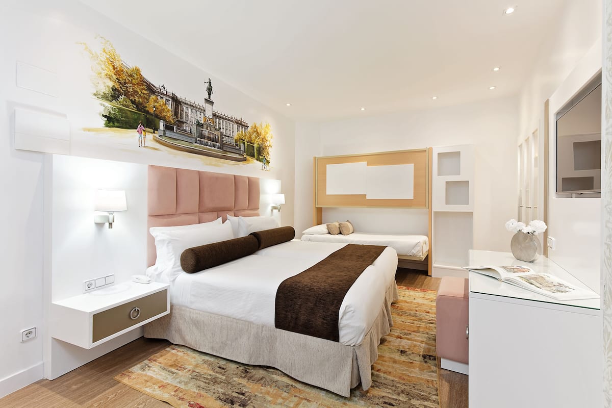 Quadruple Room | Down duvets, minibar, in-room safe, desk