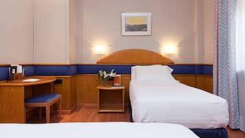 Triple Room (adult extra bed) | Minibar, in-room safe, desk, laptop workspace