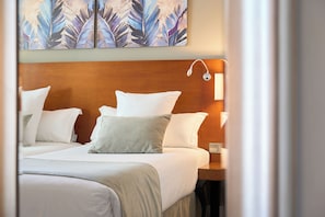 Select Comfort-bedden, een kluis op de kamer, een bureau