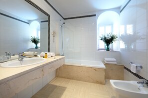 Eco-friendly toiletries, hair dryer, bidet, towels
