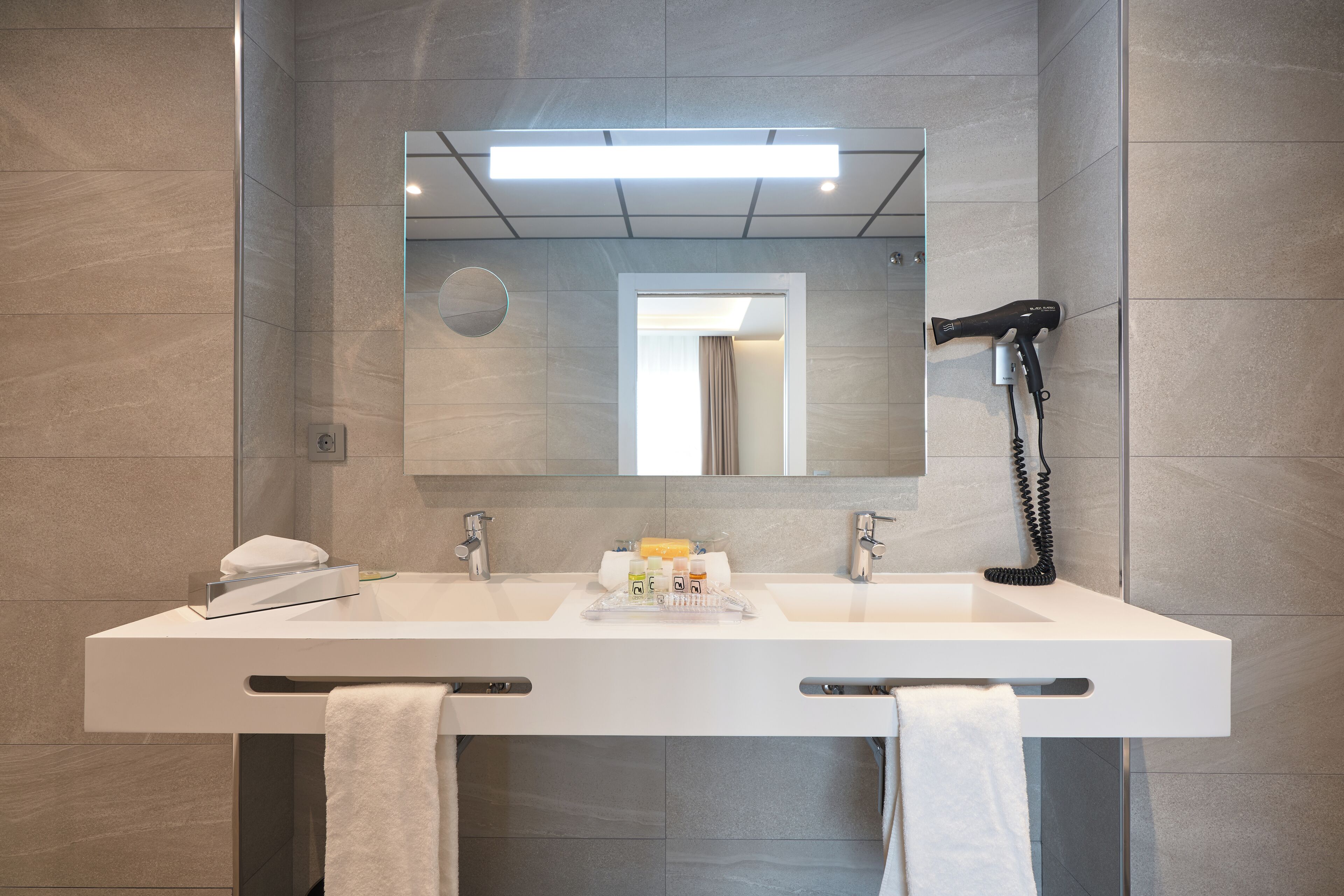 junior suite | bathroom | rainfall showerhead, free toiletries, hair dryer, slippers