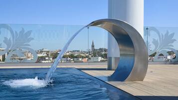 Outdoor pool, pool umbrellas, pool loungers