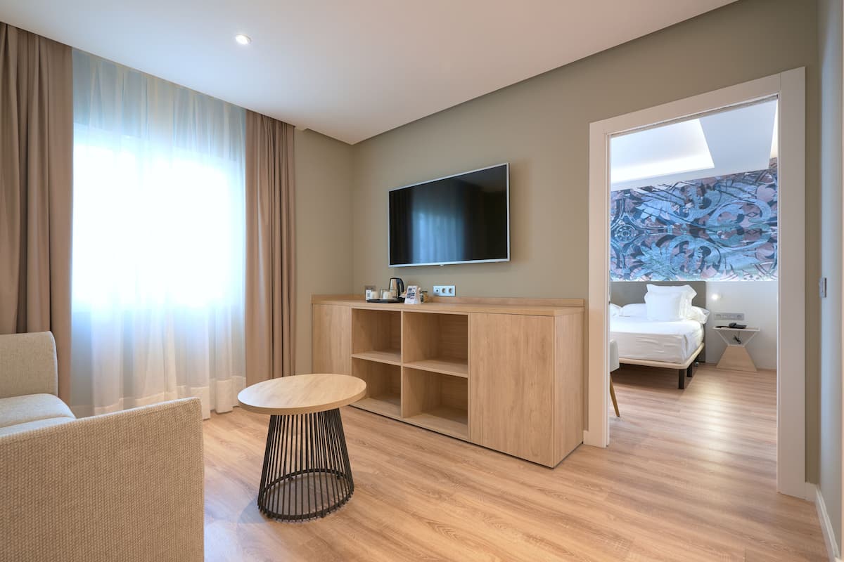 Suite Junior | 1 chambre, draps en coton égyptien, literie de qualité, couette en duvet