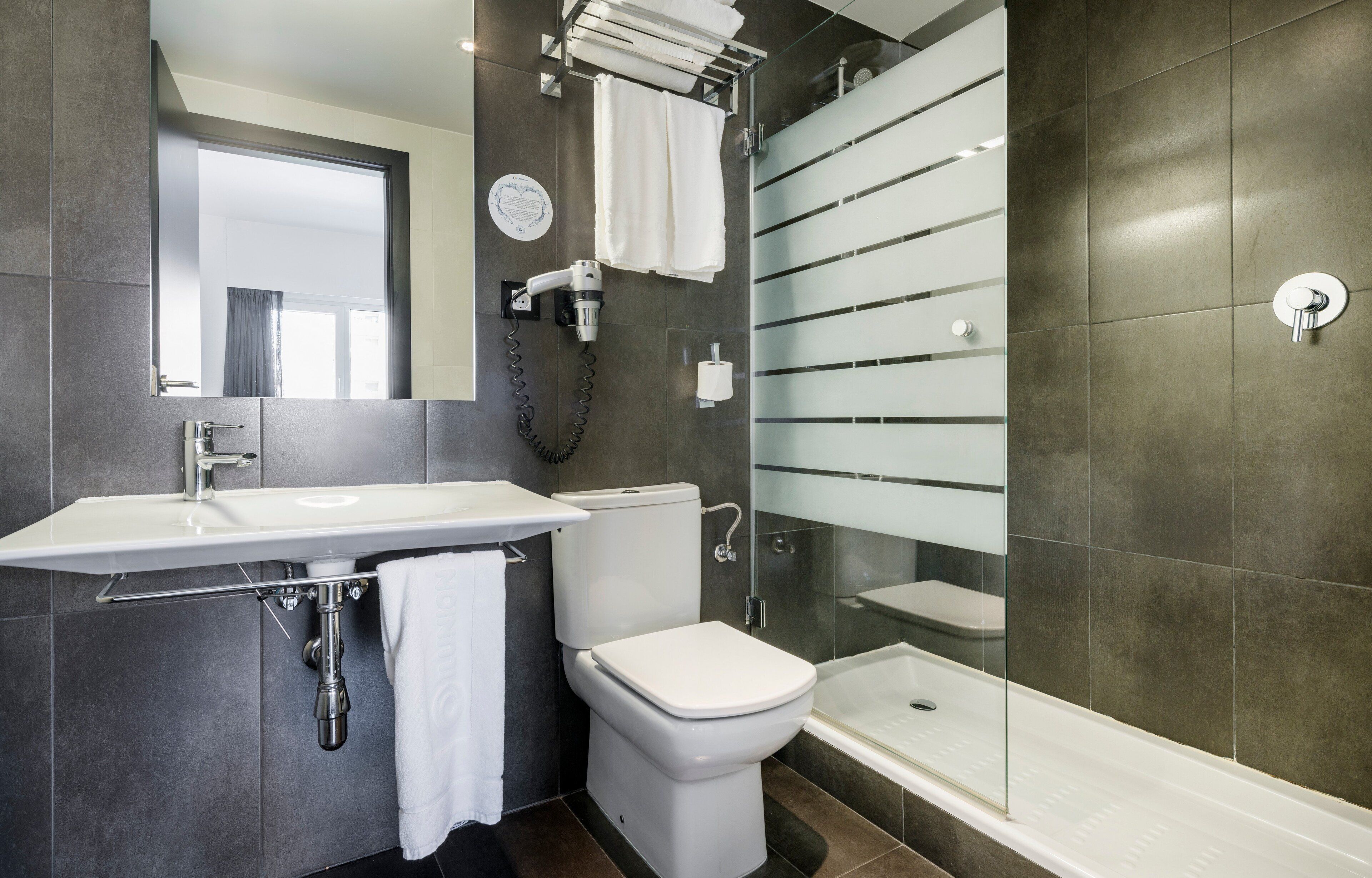 premium room | bathroom | eco-friendly toiletries, hair dryer, towels