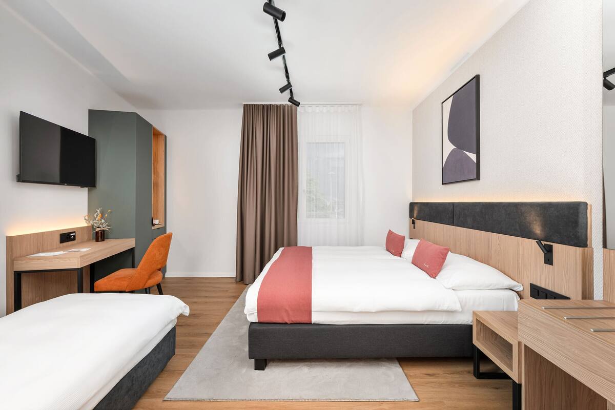 Standard Triple Room | Minibar, in-room safe, desk, WiFi (free)