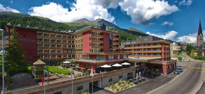 Experience breathtaking views of the surrounding mountains from the hotel's spacious balconies and large windows.
