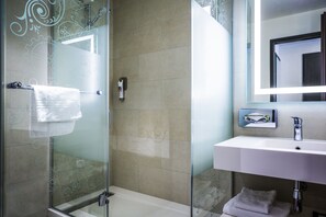 Shower, free toiletries, hair dryer, towels
