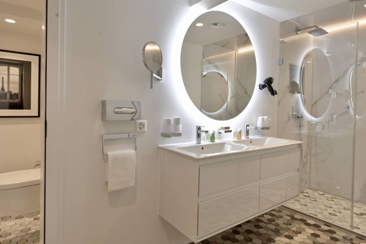 owners suite | bathroom | designer toiletries, hair dryer, towels, soap