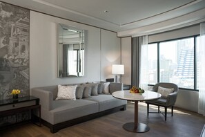 エグゼクティブ スタジオスイート 1 ベッドルーム | リビング エリア | 液晶テレビ