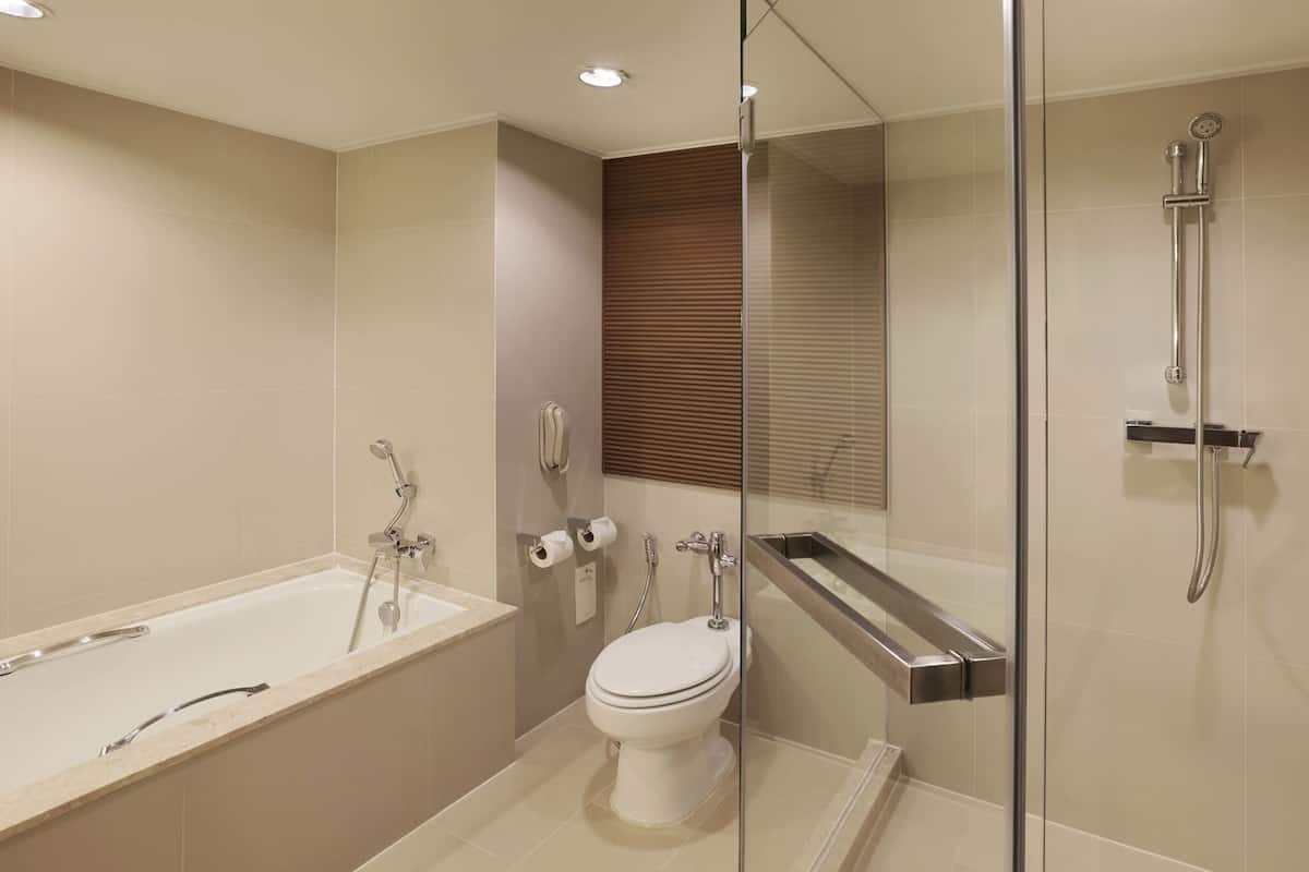 Bathroom | Designer toiletries, hair dryer, bathrobes, slippers