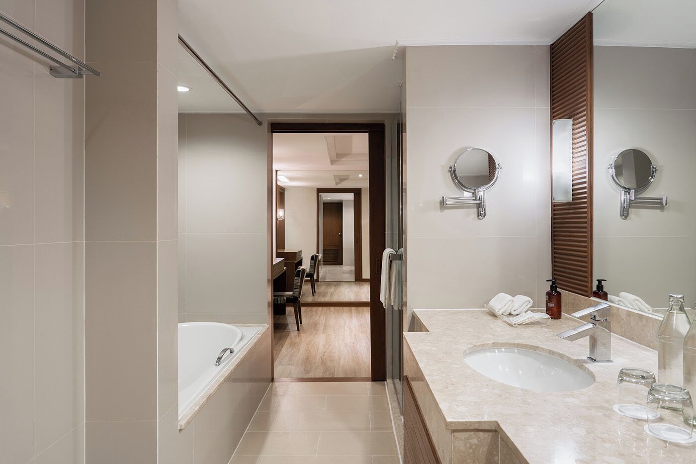 junior suite twin with exclusive benefits | bathroom | designer toiletries, hair dryer, bathrobes, slippers