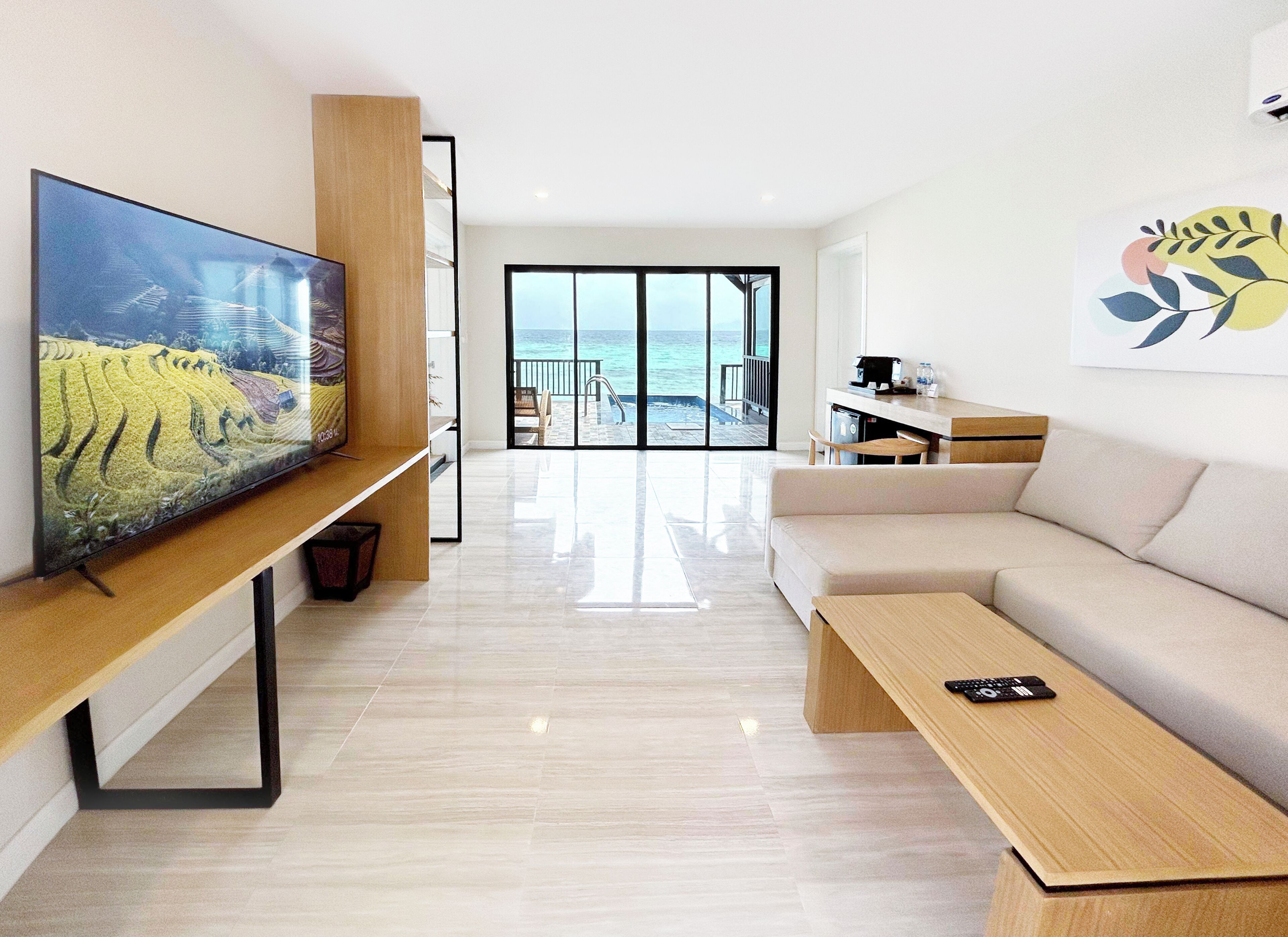 two-bedroom suite | living area | 32-inch flat-screen tv with cable channels, tv