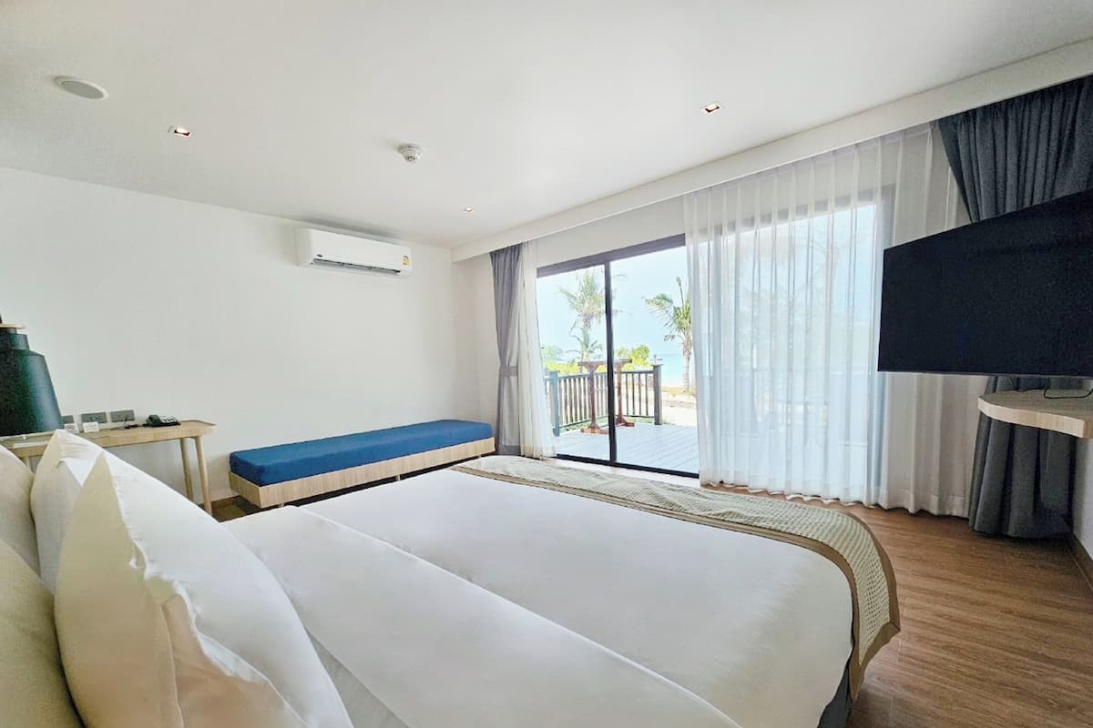 Beachfront Premier Room | 1 bedroom, in-room safe, individually decorated, individually furnished