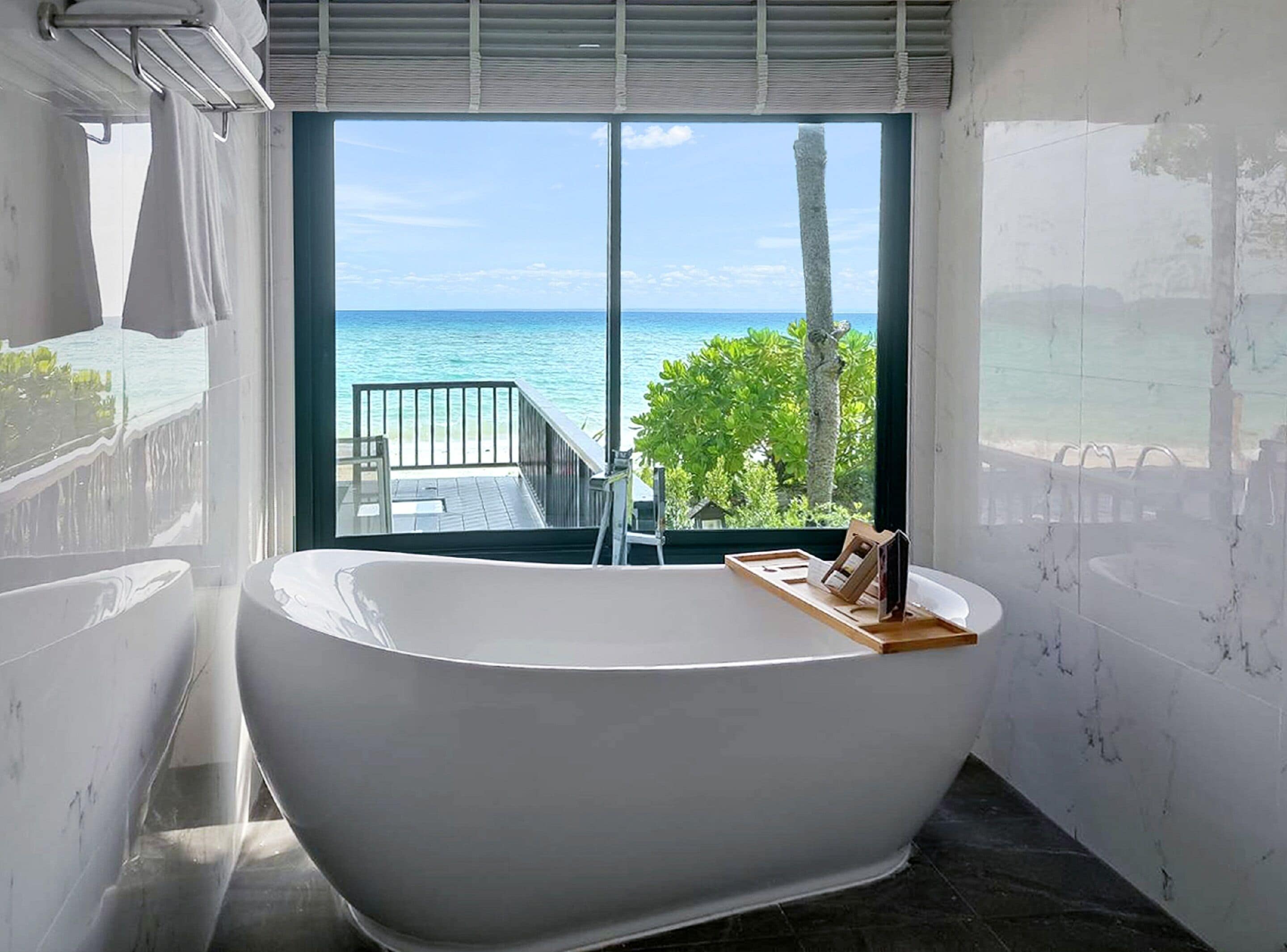 beachfront premier pool | bathroom | free toiletries, hair dryer, bathrobes, slippers