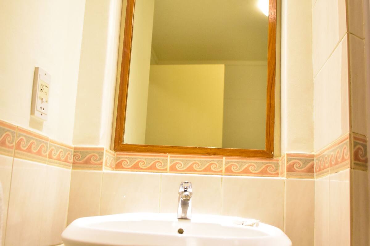 bathtub, eco-friendly toiletries, towels