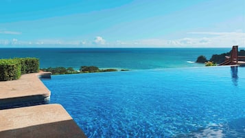 2 outdoor pools, pool umbrellas, sun loungers