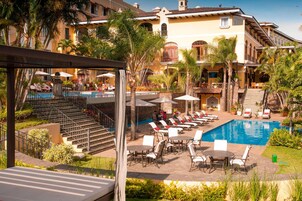 2 outdoor pools, open 6:00 AM to 9:00 PM, free pool cabanas