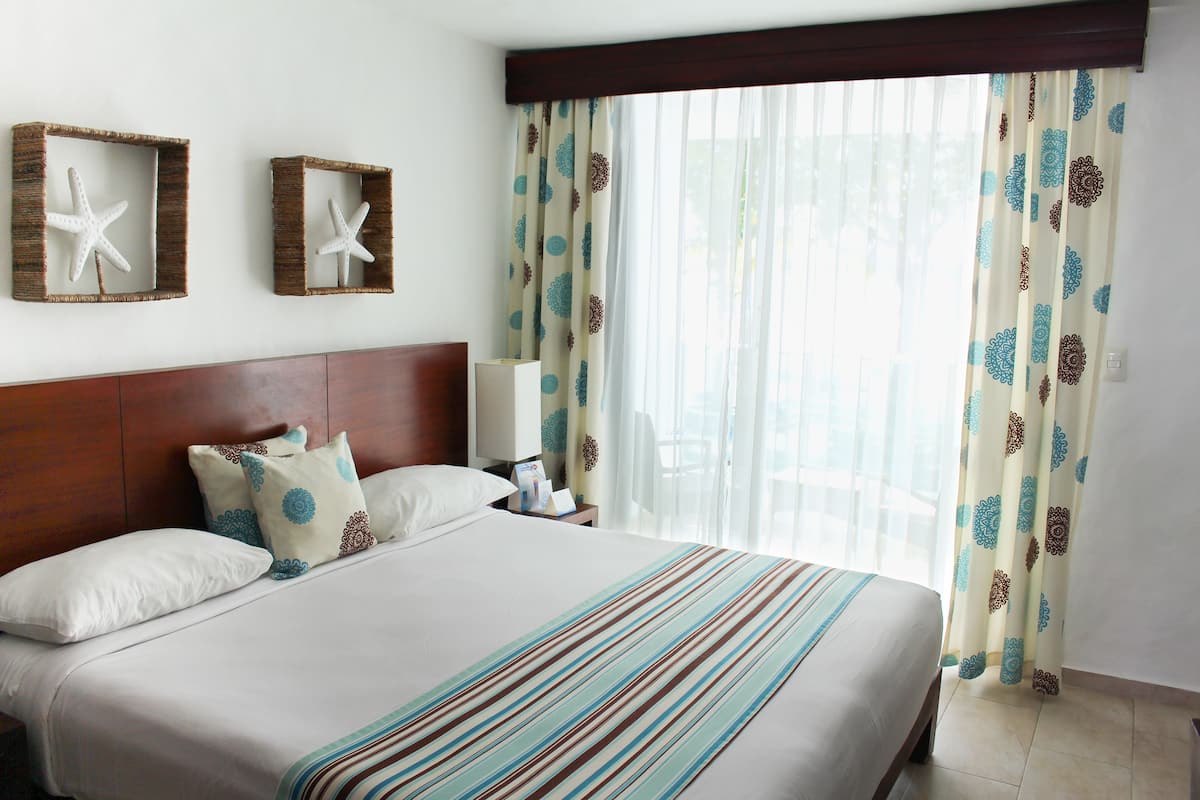 Down comforters, pillowtop beds, in-room safe, desk