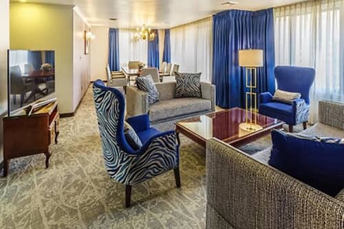 Presidential Suite | Living room | 40-inch flat-screen TV with cable channels, TV