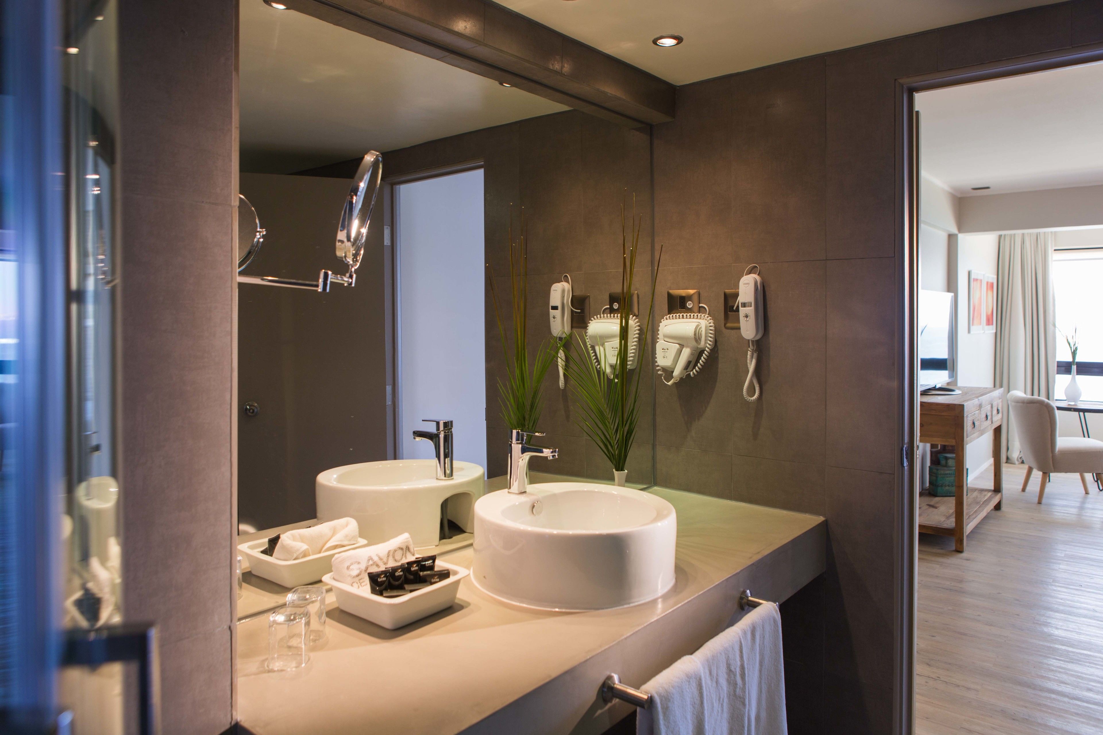 shower, rainfall showerhead, hair dryer, towels