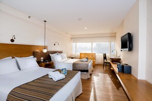 Premium bedding, down comforters, minibar, in-room safe