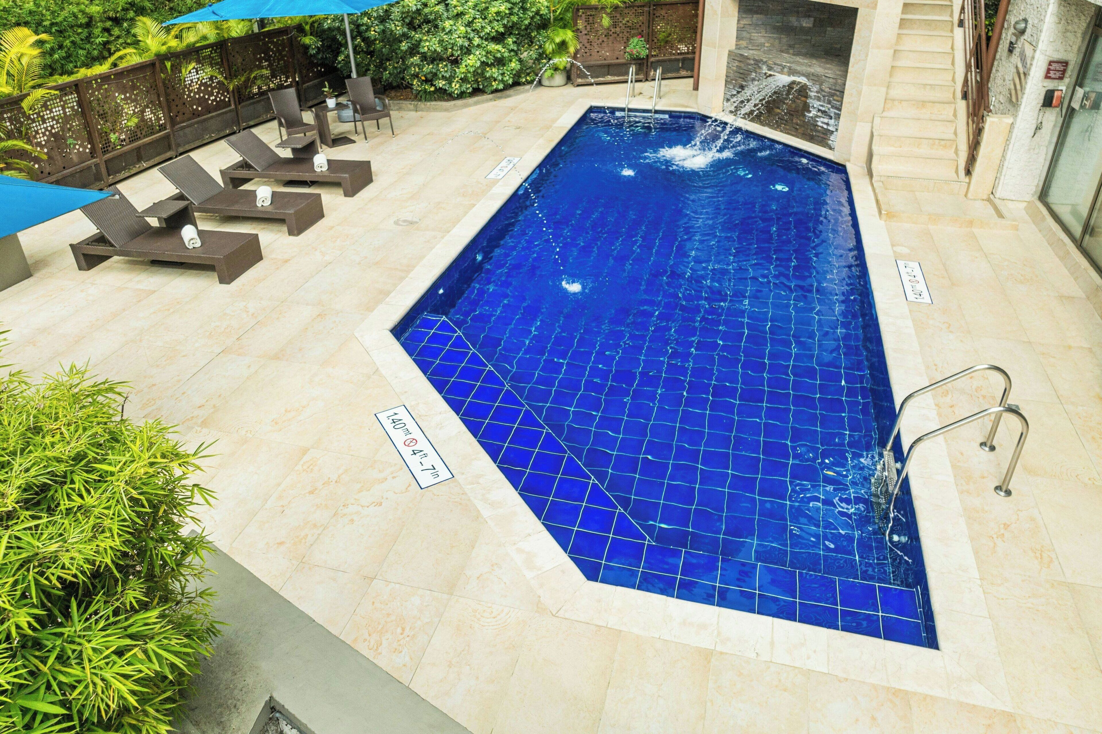 outdoor pool, pool umbrellas