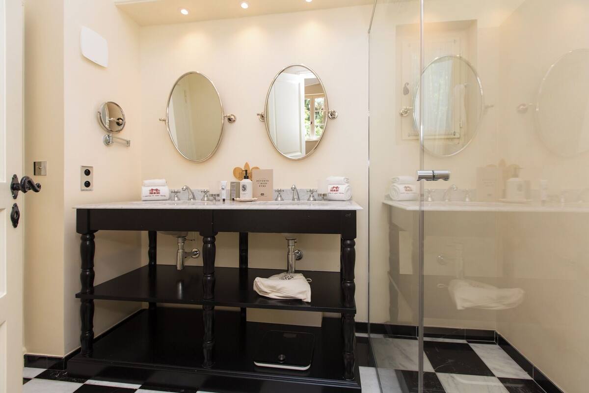 junior suite, 1 queen bed with sofa bed | bathroom | shower, hair dryer, bathrobes, slippers