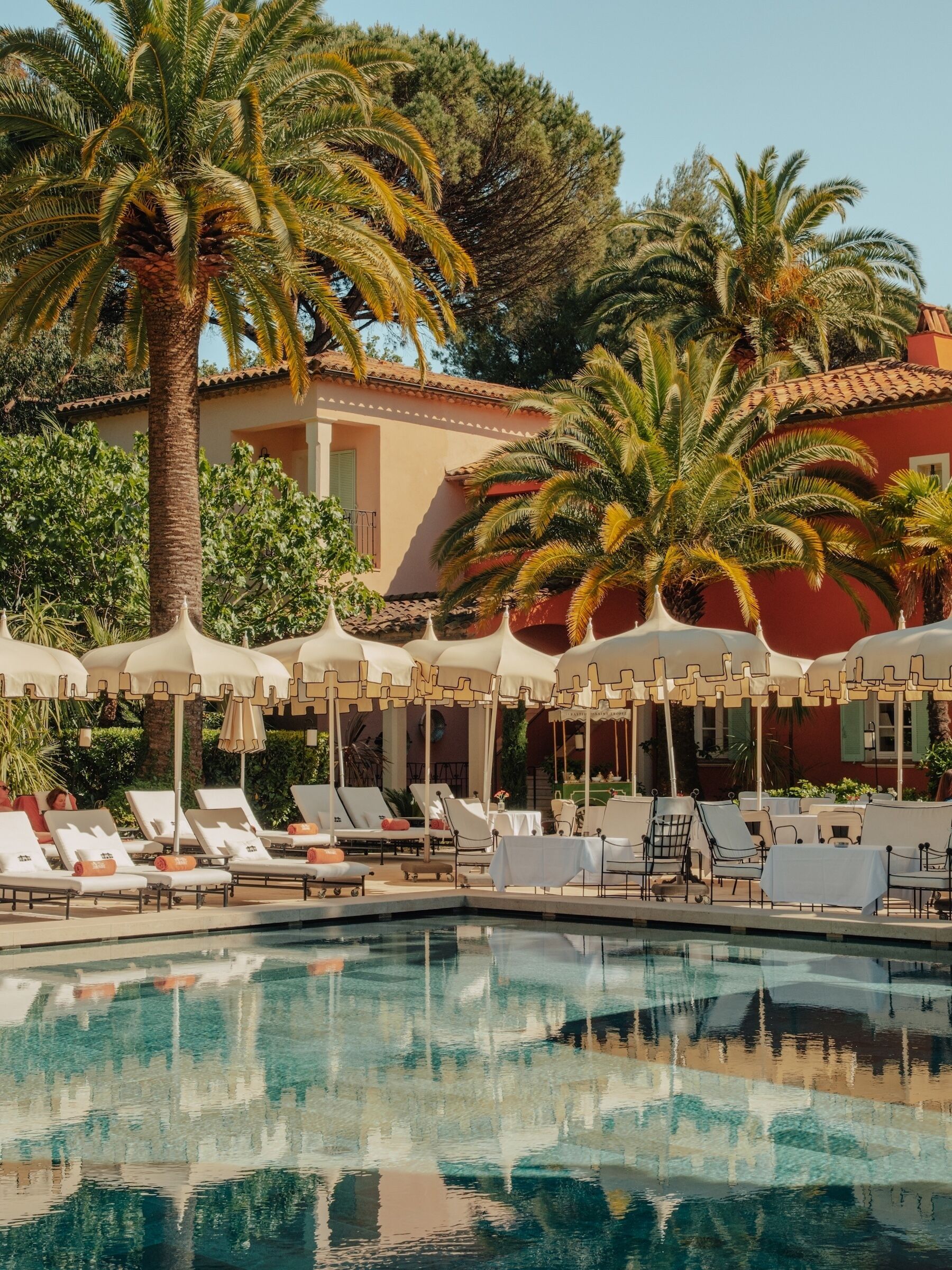 Seasonal outdoor pool, pool umbrellas, pool loungers