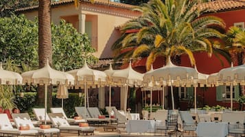 Seasonal outdoor pool, pool umbrellas, pool loungers