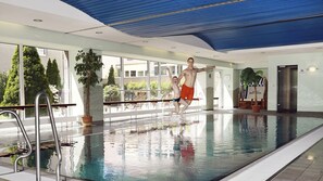 Indoor pool, open 6:00 AM to 9:00 PM, pool loungers