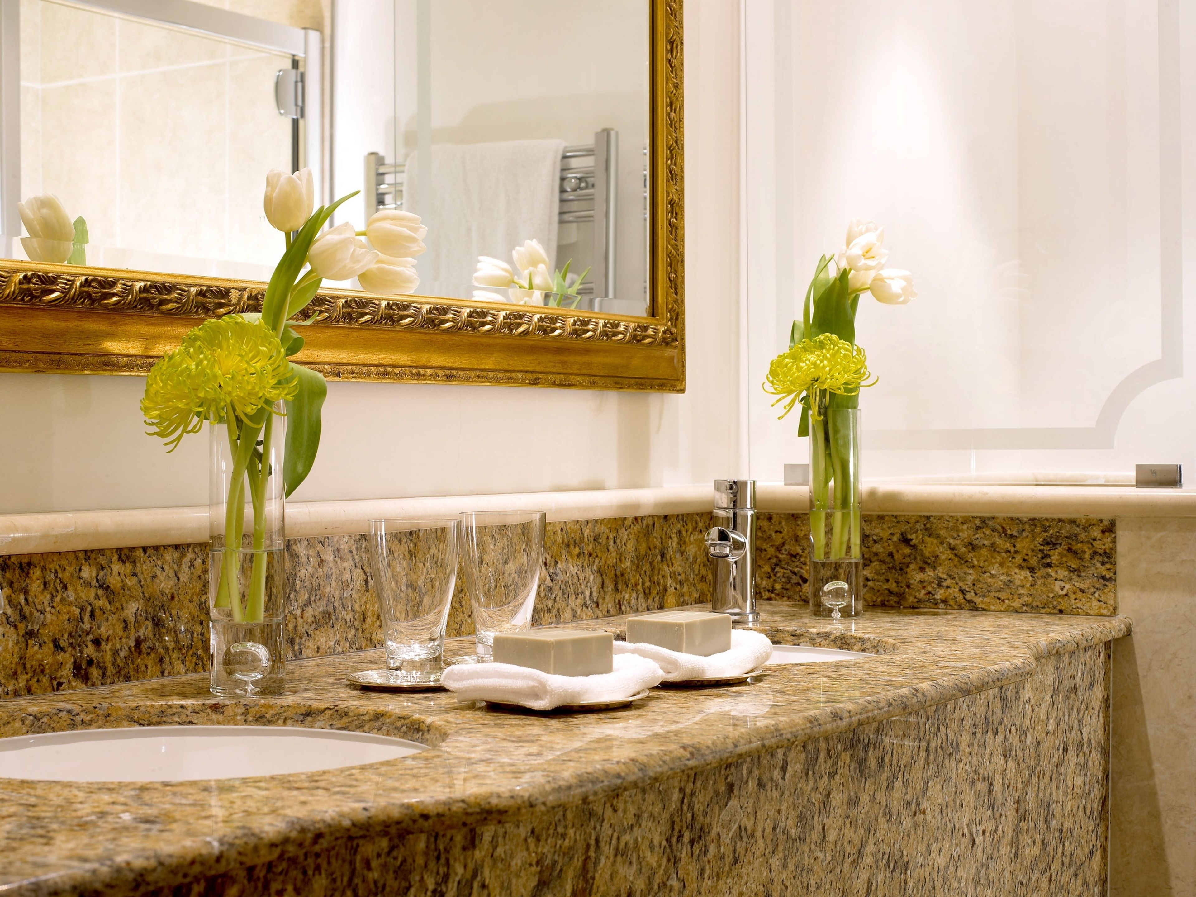 designer toiletries, hair dryer, bathrobes, slippers