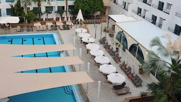 Outdoor pool, pool umbrellas, pool loungers