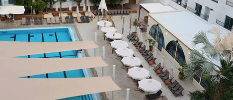Outdoor pool, pool umbrellas, pool loungers