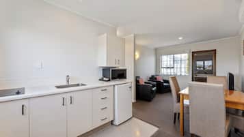 One Bedroom Spa Suite | Private kitchenette | Mini-fridge, microwave, stovetop, coffee/tea maker