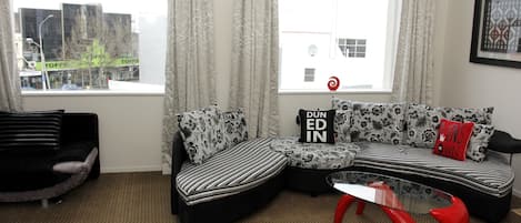 Standard Suite, Multiple Bedrooms, Non Smoking, Kitchen (3 bedroom apartment) | Living area | Flat-screen TV