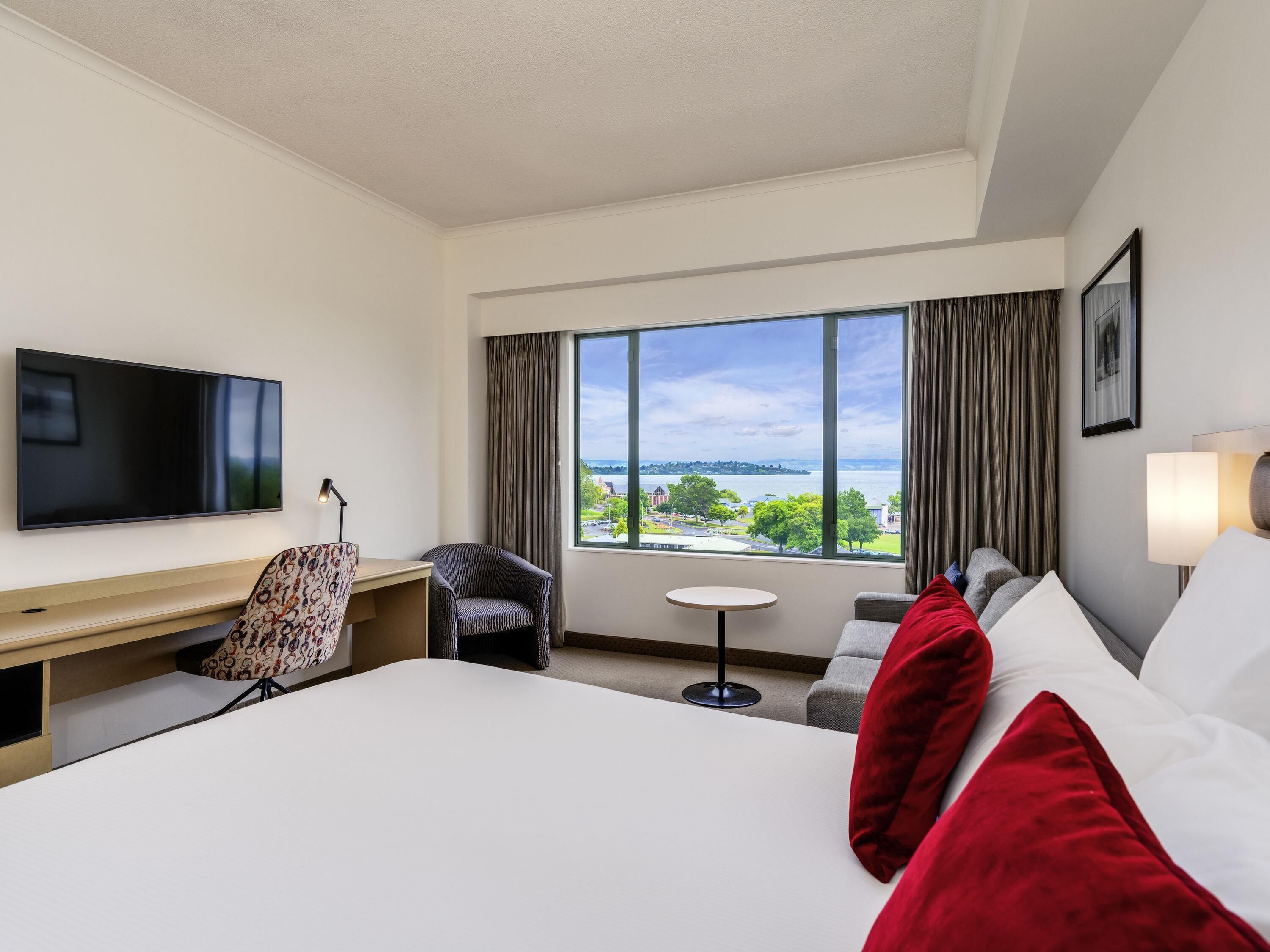 Room, 1 King Bed, Lake View | Hypo-allergenic bedding, minibar, in-room safe, desk