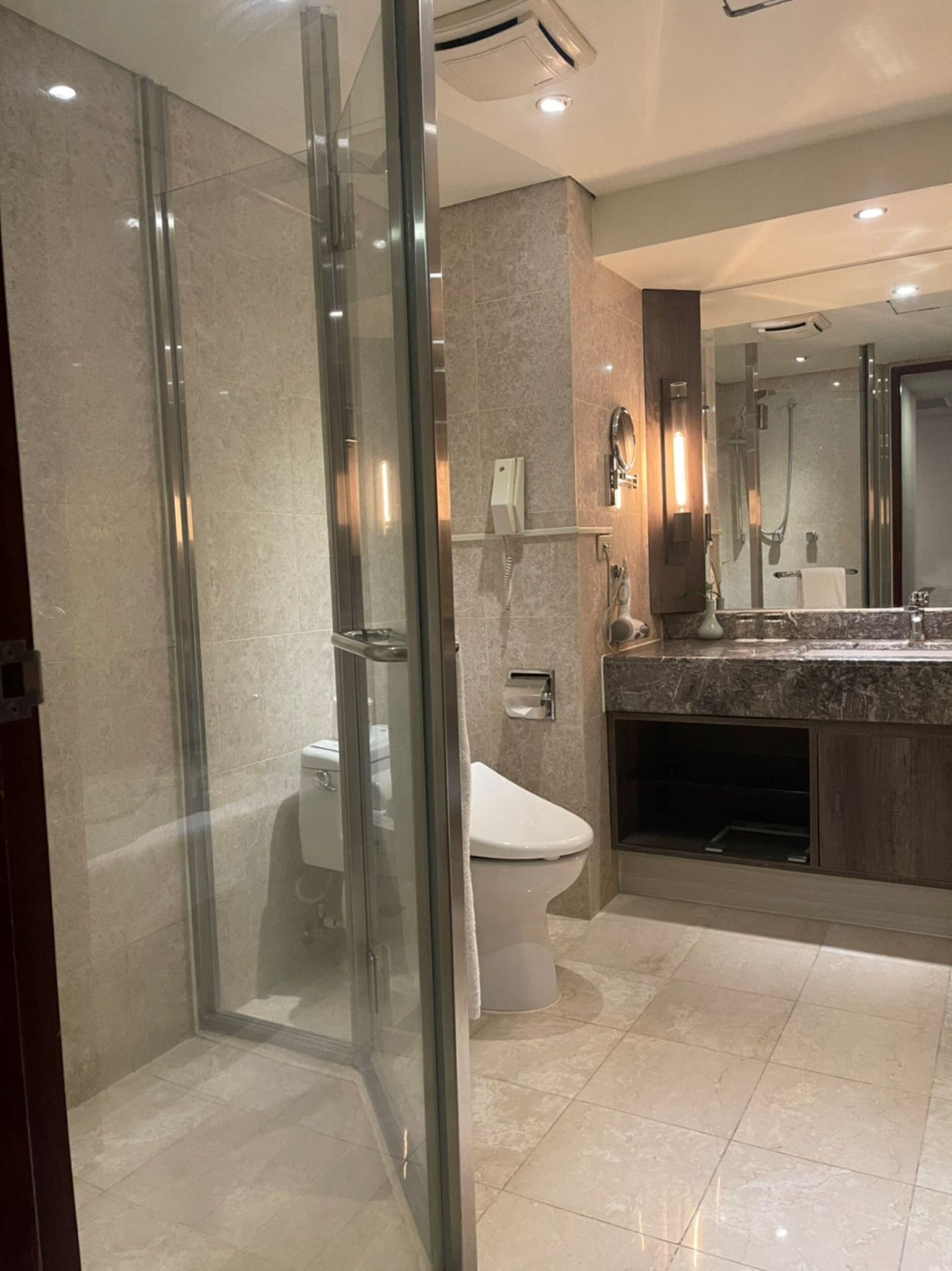 separate bathtub and shower, deep-soaking bathtub, rainfall showerhead