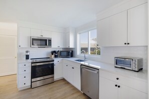 Townhome, 3 Bedrooms, 2 Bathrooms | Private kitchen | Fridge, microwave, coffee/tea maker