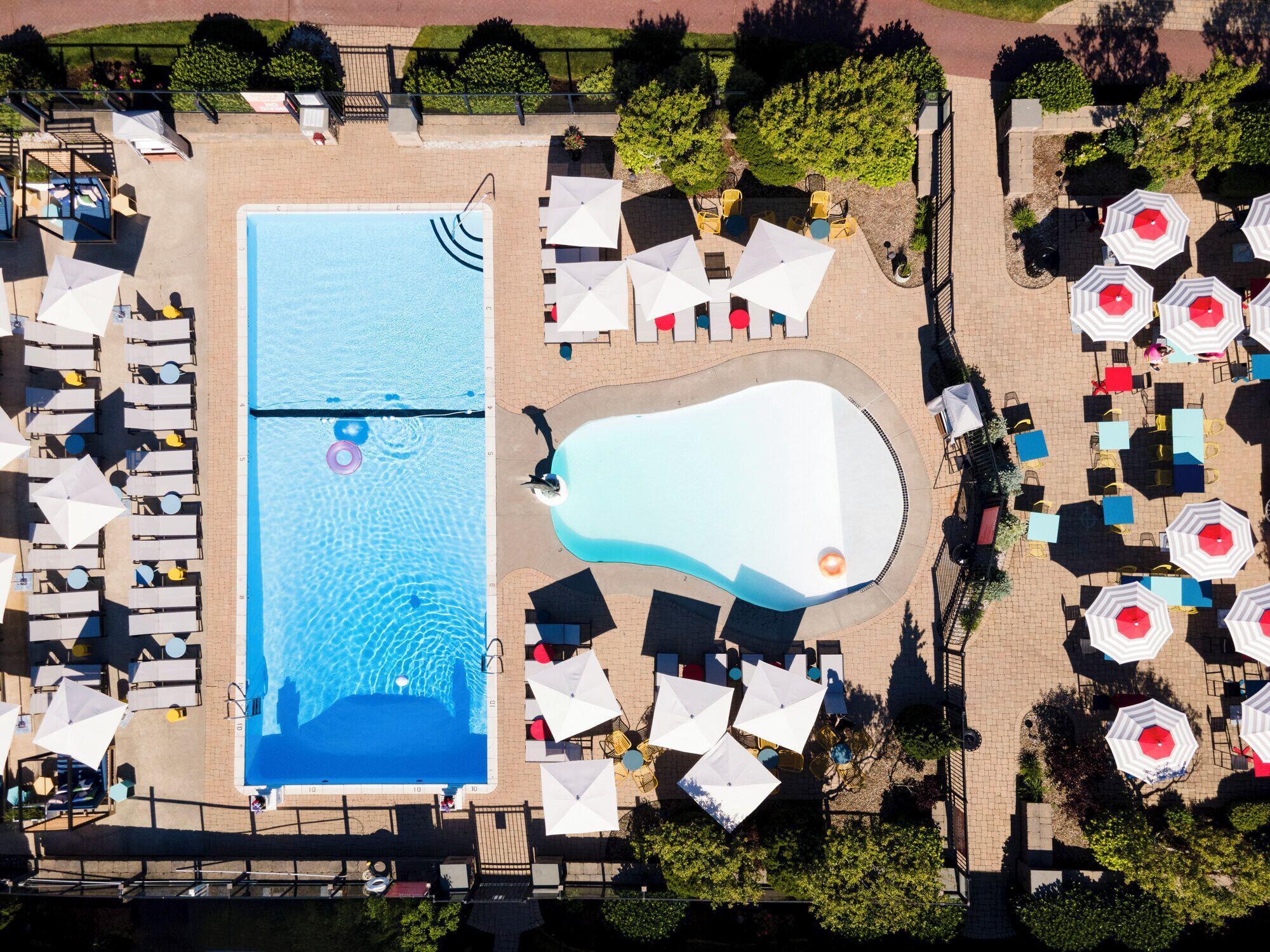 indoor pool, seasonal outdoor pool, pool umbrellas, pool loungers