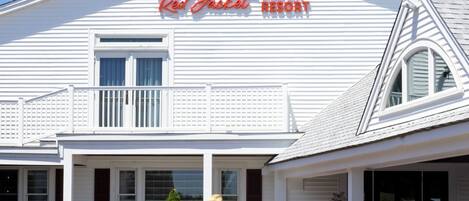 A building with a sign reading "Red Jacket Beach Resort."