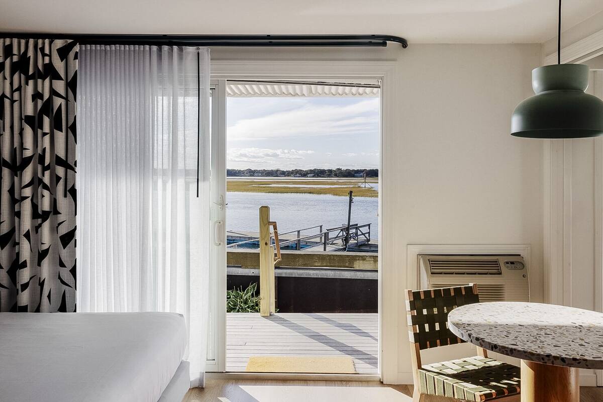 room, 2 queen beds, river view | in-room safe, desk, laptop workspace, blackout curtains