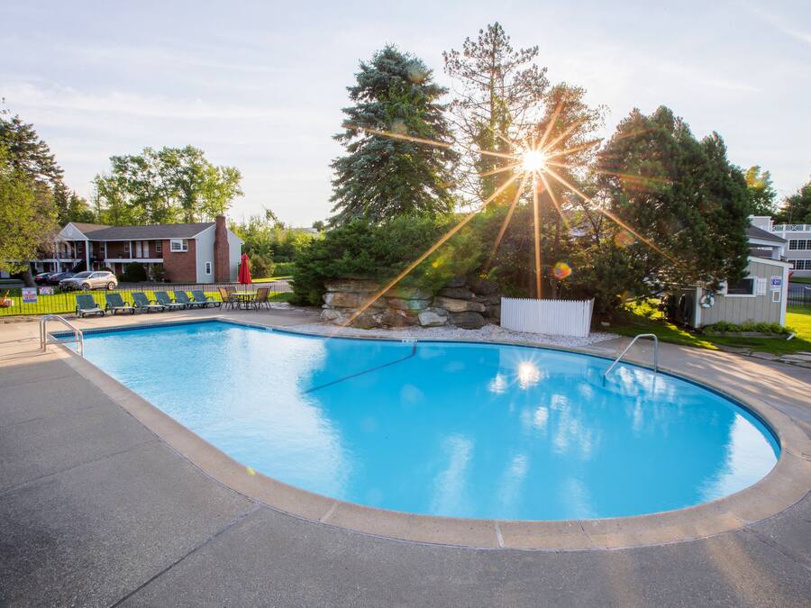Indoor pool, outdoor pool, open 8:00 AM to 10:00 PM, pool loungers