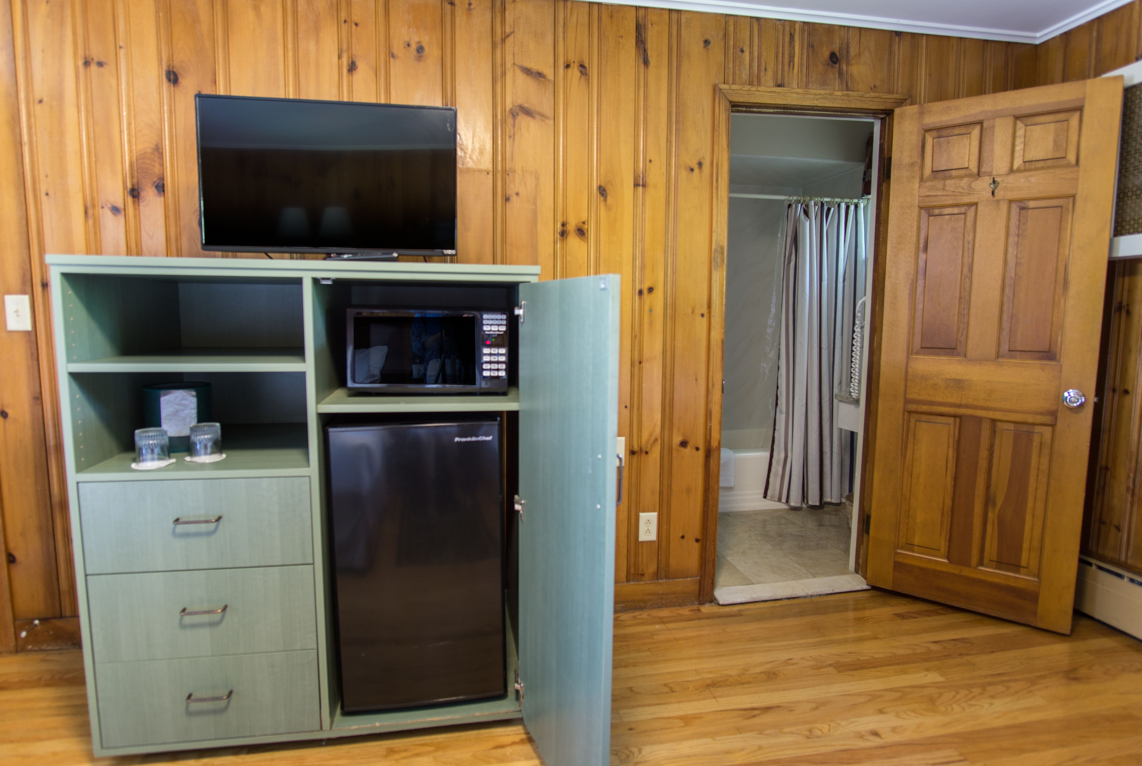 economy room, 2 double beds, ground floor | living area | flat-screen tv