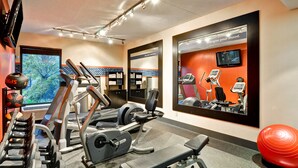 A gym with treadmills, weight machines, and exercise balls. - Hampton Inn by Hilton New Bedford/Fairhaven (Fairhaven)
