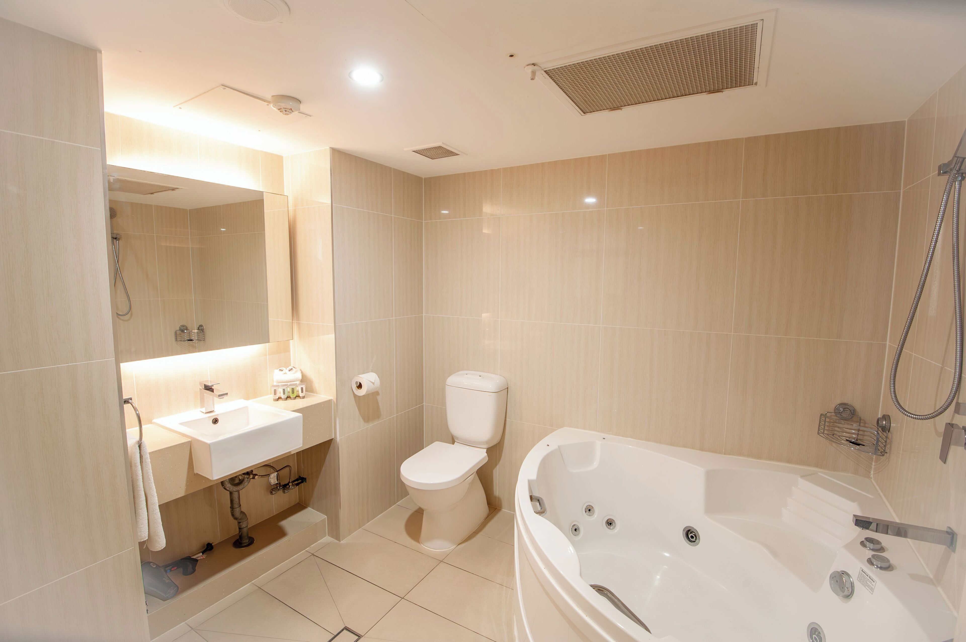 family spa suite, 1 queen and 2 singles | bathroom | free toiletries, hair dryer, towels, soap