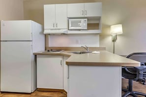 Fridge, microwave, stovetop, coffee/tea maker