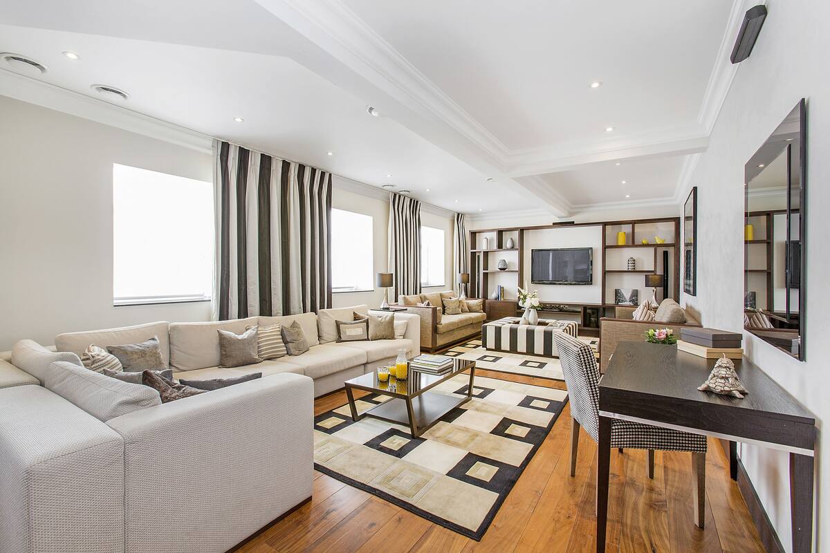 Penthouse Suite, Four Bedrooms Apartment | Living room | LCD TV, DVD player