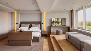 Premium bedding, down duvets, in-room safe, desk