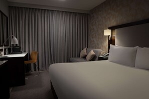 Kamar Superior, 1 Tempat Tidur King dengan tempat tidur Sofa | Brankas, kedap suara, setrika/meja setrika, dan Wi-Fi gratis