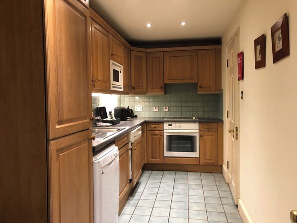 Two Bedroom Apartment Suite with Kitchenette | Private kitchen | Coffee/tea maker